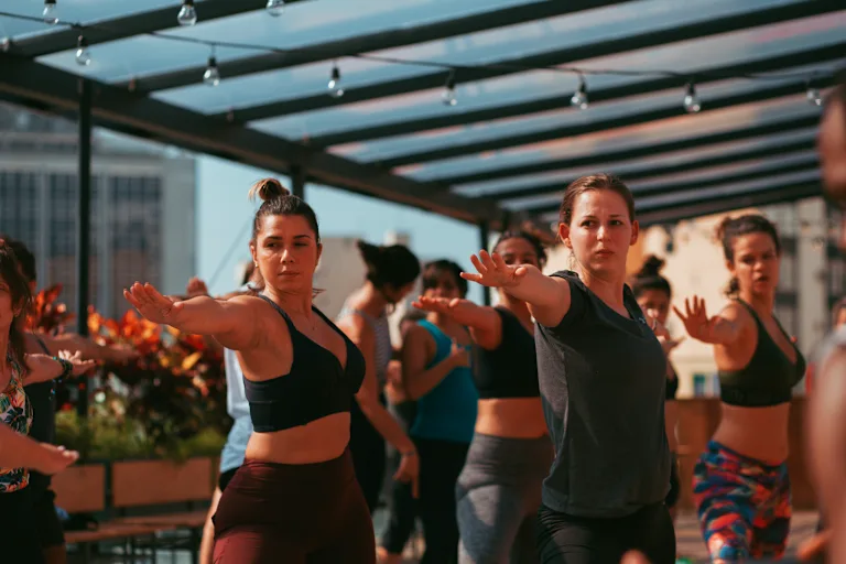 Group yoga session on rooftop at Wellness Lab Rio